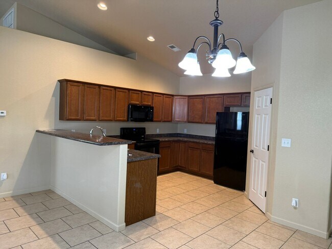 Building Photo - Beautiful 4 bedroom, 2 bath, 3 car garage ...
