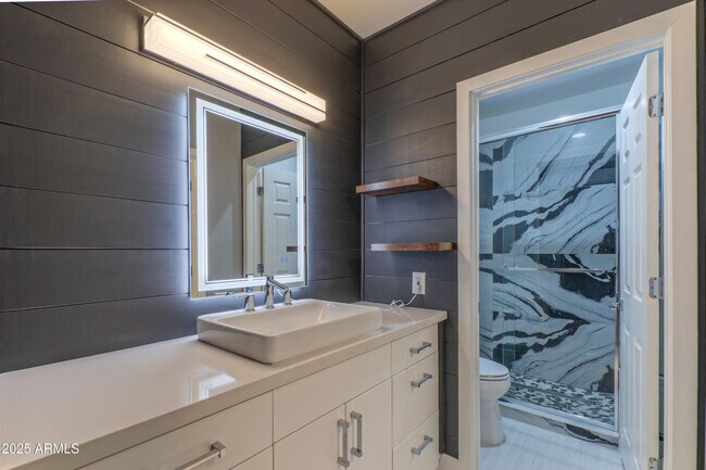 Building Photo - 9450 E Becker Ln