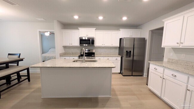 Building Photo - 5693 Old Stone Blvd