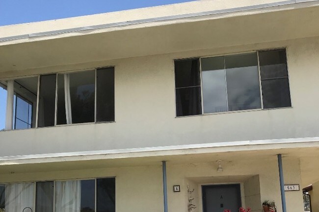 Front of Building with garden - 563 Avenue A
