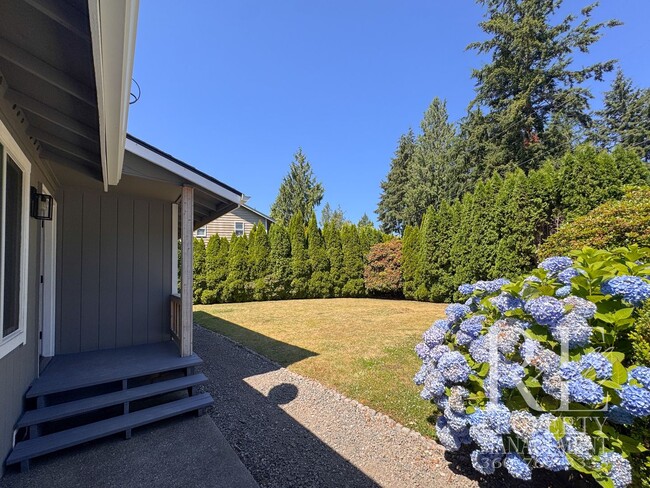 Building Photo - Renovated Poulsbo Home with A/C, & Covered Outdoor Living