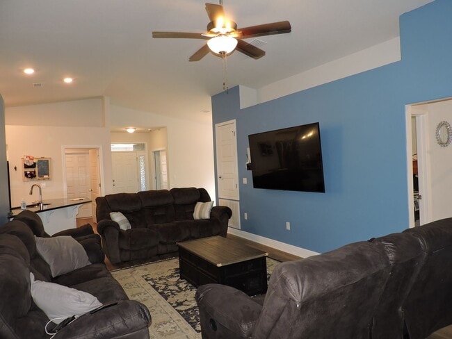 Building Photo - Almost new four bedroom home with solar pa...