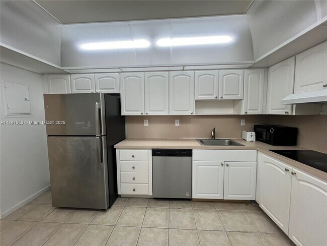 Building Photo - 19380 Collins Ave