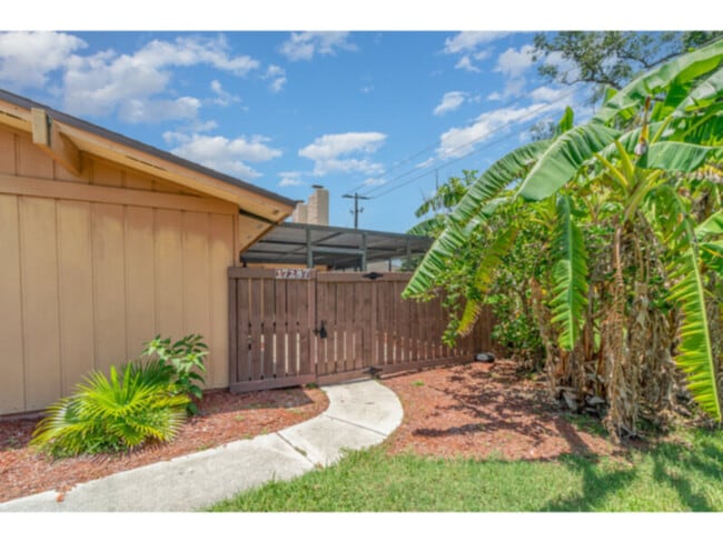 Building Photo - Lawn Care Included! Great Location, Pool, Tennis Court, Assigned Parking Spaces,