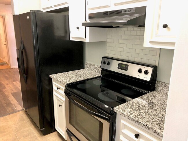 Building Photo - Available 9/15. Beautifully Remodeled Town...
