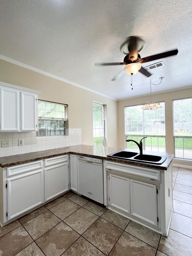 Building Photo - Available NOW!!!! This beautiful 2 story, 4 bedroom, 2 bath, two car garage with garage door open...