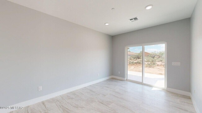 Building Photo - 7095 W Los Reales Rd