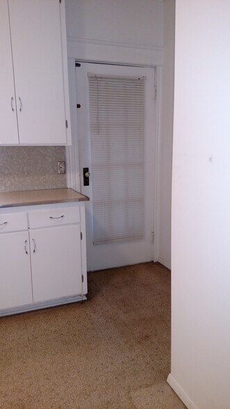 Kitchen side door to deck & yard - 2504 Chili Ave