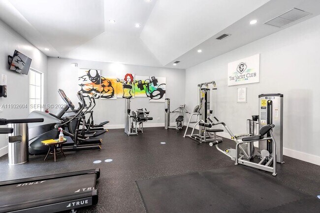 Building Photo - 19999 E Country Club Dr