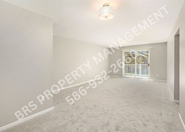 Building Photo - Charming 2-Bedroom Condo in Clinton Twp. –...