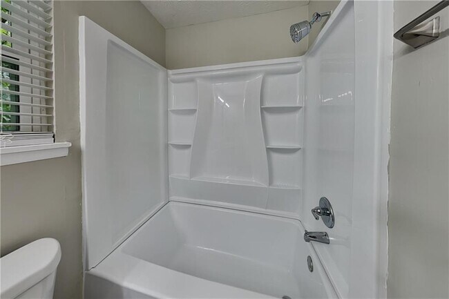 Building Photo - 6627 Windwood Cir