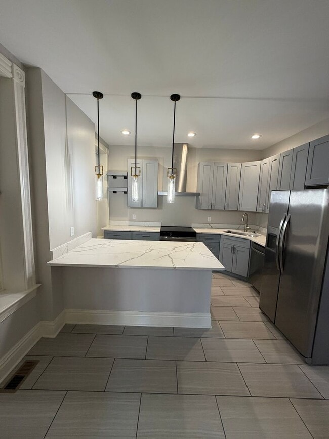 Building Photo - Bright & Spacious 3BR in The Grove – Walk to Shops & Dining!