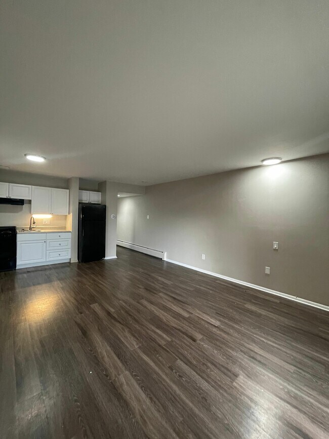 Embrace the elegance of this open-concept living space, perfect for modern living. - GRACE LANDINGS APARTMENTS
