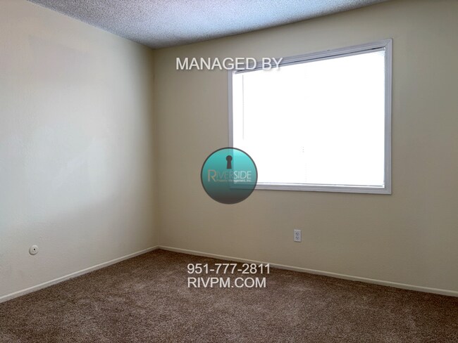 Building Photo - DISCOVER YOUR DREAM CONDO IN COLTON!!!