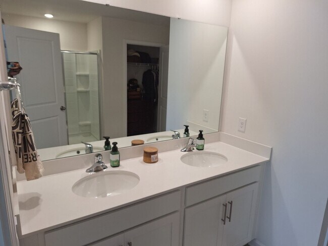 Building Photo - Lovely Four Bedroom Home  Appropriately 5 ...