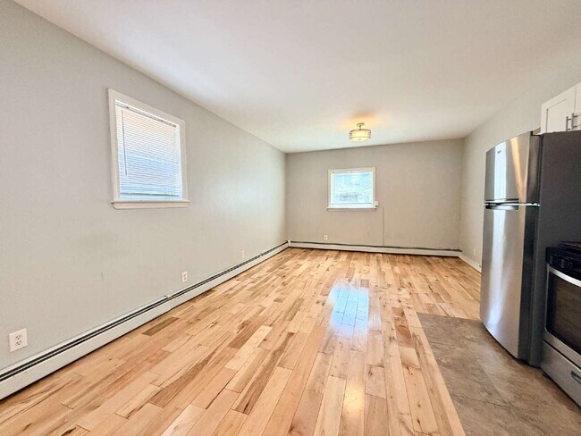 Building Photo - Move in July 1st • Spacious 1BR w/ Bonus Room Open Layout • Assigned Parking • Appliances • Garfield