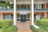 Building Photo - Beautifully remodeled two-story condo in a...