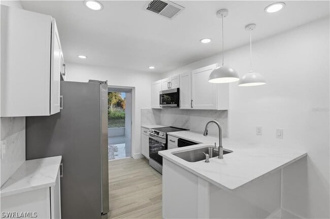 Building Photo - 7595 Winged Foot Dr