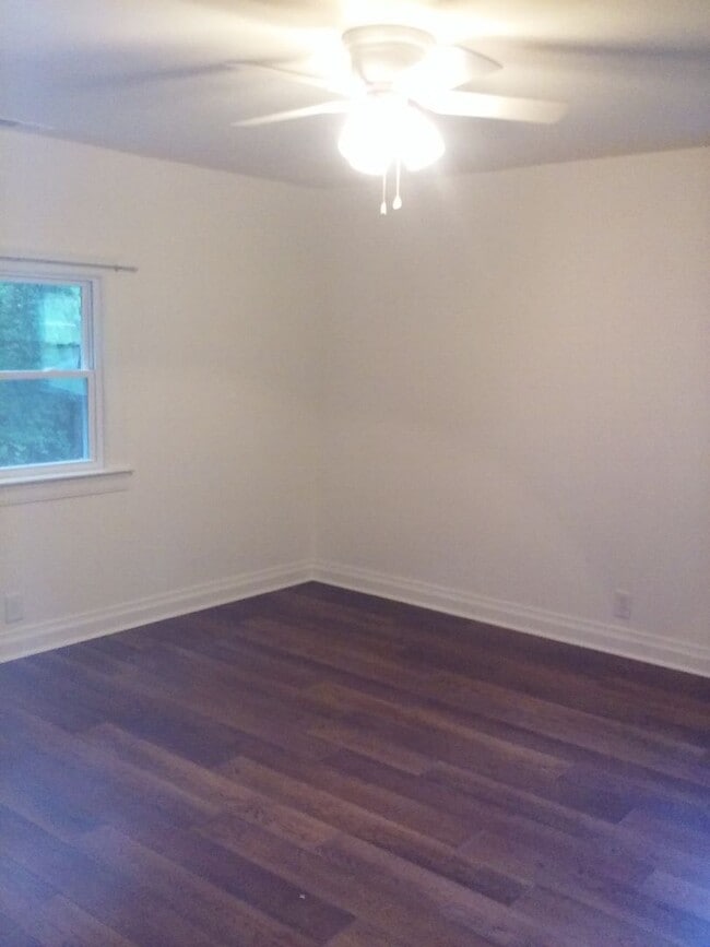 Building Photo - Cute log house in the woods off Charlotte Pike with EV charging!