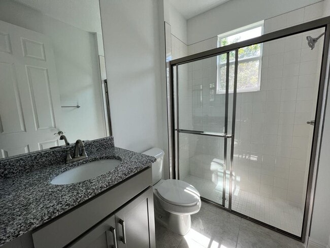 Building Photo - This Charming Brand-New Home is a 4/3 with...