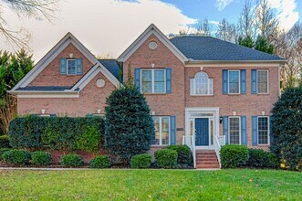 Building Photo - Available Now - Large 5 BD/3 Full Bath Home with Fenced Yard