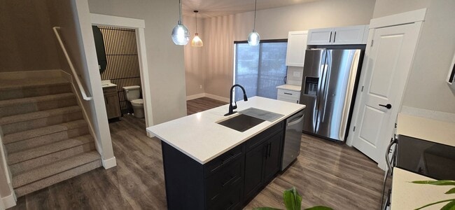 Building Photo - Come check out this beautiful 3 story town...