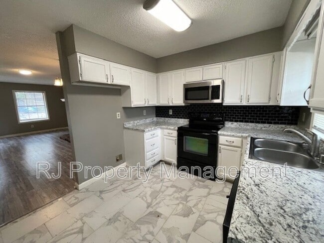 Building Photo - 6989 Amberly Way Dr