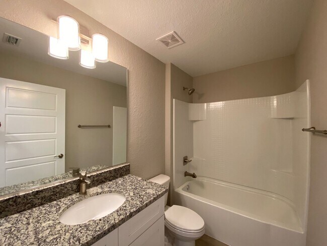 Building Photo - *** COMING SOON NOT AVAILABLE FOR SHOW UNIT MID APRIL....3/2/2 Silver Spring Shores **Won't Last***