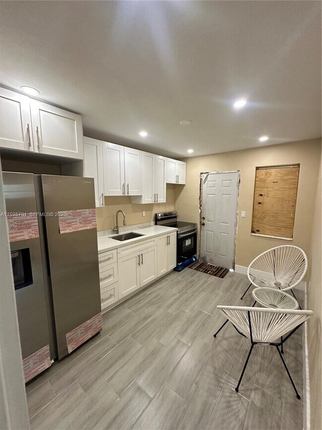 Building Photo - 234 NE 55th Terrace