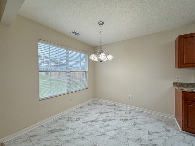 Building Photo - 5021 Scotch Pine Ave