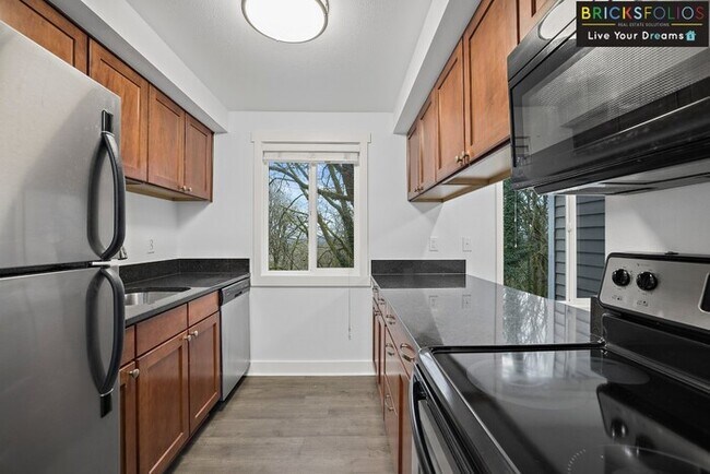 Building Photo - Nestled in the serene Eastgate neighborhood, Bellevue!
