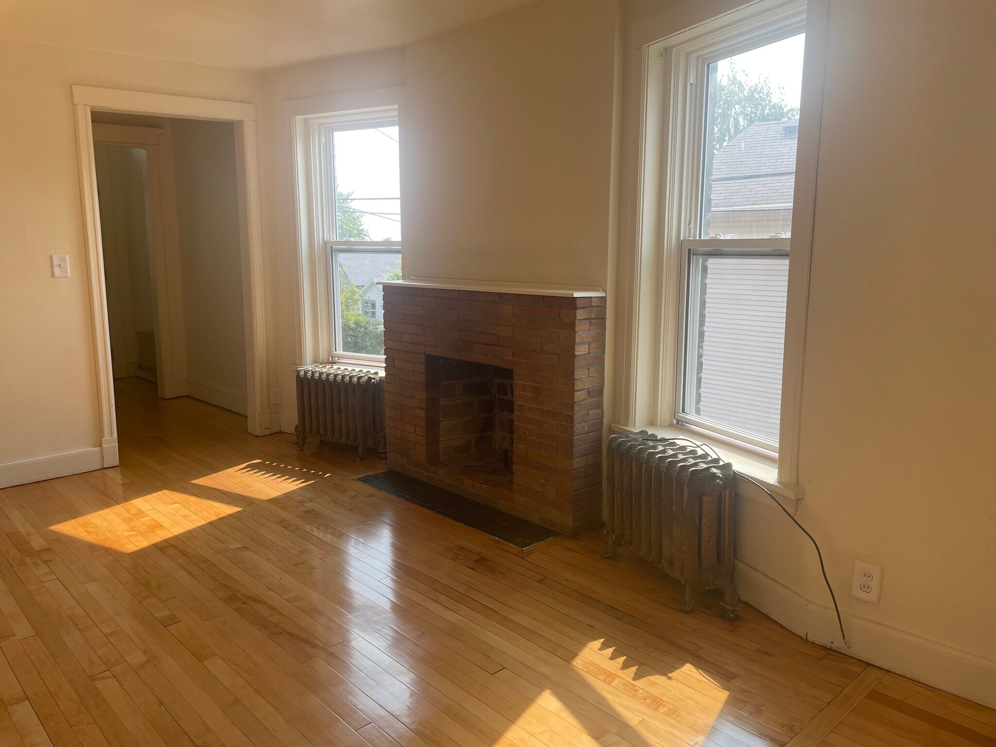Decorative fireplace in living room - 319 N 4th Ave W