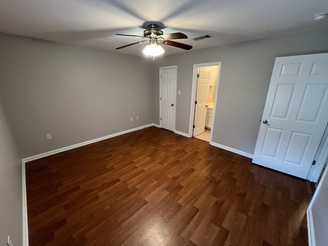 Building Photo - Charming 4-Bedroom Home with Large Backyar...
