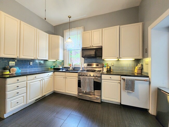 Building Photo - Elegant, spacious, modern Victorian in the...