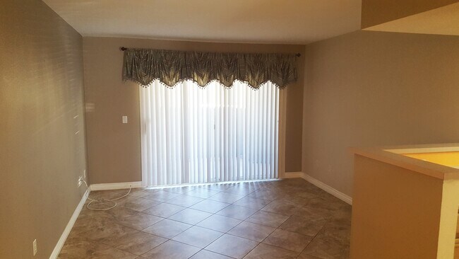 Building Photo - Three Bedroom Southwest Condo, Tile, Ground Floor