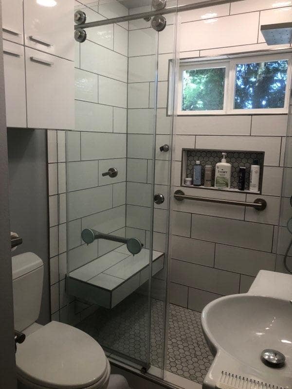 Sitting bench in walk in shower - 8528 SW 35th Ave