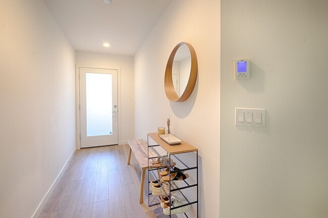 Building Photo - Impeccable Designer Townhome