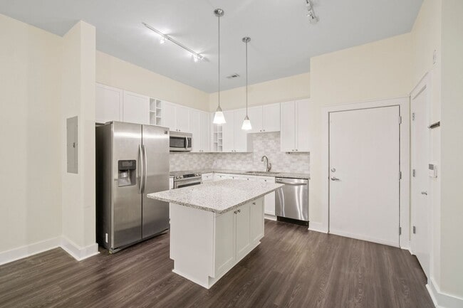 Building Photo - COMING SOON! Modern 1BR/1BA in First Ward – Walk to Parks, Dining & Entertainment