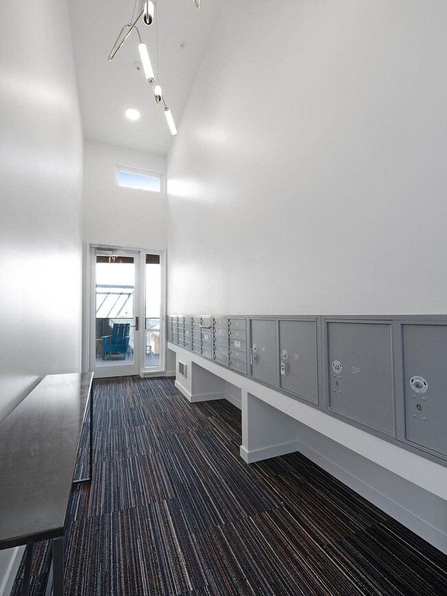 Secure mail and package delivery area - 401 Linden St