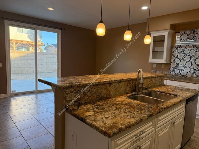 Building Photo - New Year Special! 50% Off First Months Rent!