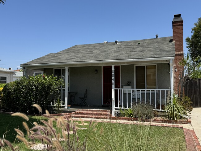 Front porch with bistro table - 8046 Westlawn Ave