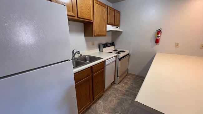 Building Photo - 1 Bedroom Condo in Independence Park w/Garage and Washer/Dryer! Call Today!