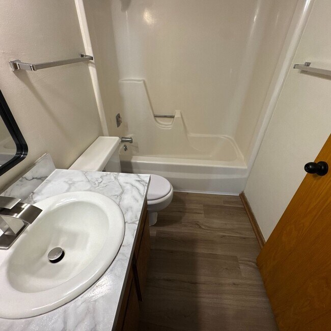 Building Photo - Stylish 1-Bedroom Apartment with Luxurious Updates in a Serene Setting