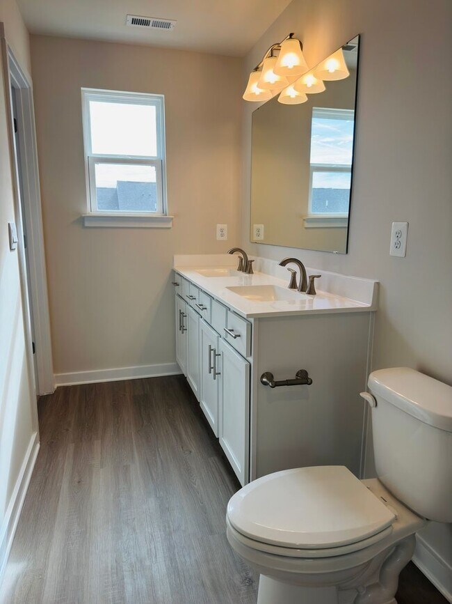 Building Photo - Brand New 4 Bed 3.5 Bath End Unit Townhome in Inwood