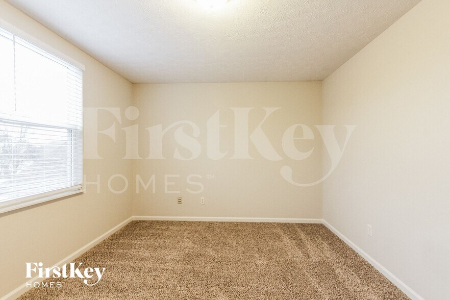 Building Photo - 9223 Timpani Way