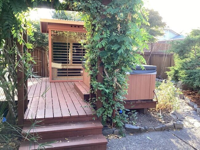 Building Photo - Look No Further, this home has it all- Hot Tub, Sauna, EV Charger, Solar, KOI Pond & More