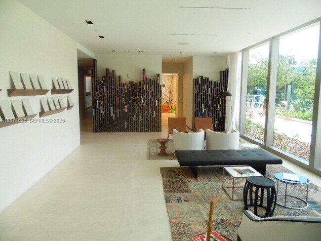 Building Photo - 10201 Collins Ave