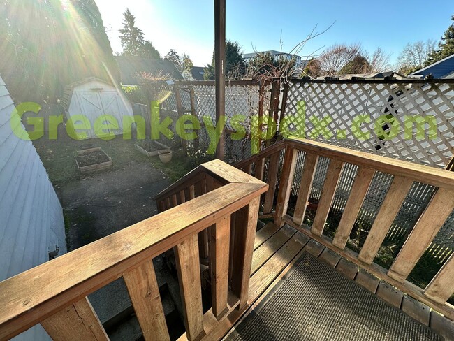 Building Photo - Huge, fenced back yard! Garage! Nice bonus...