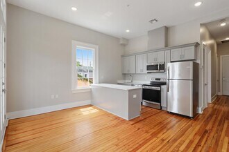 Building Photo - Historic Garden District Renovation with Front Balcony one block to St. Charles Streetcar!