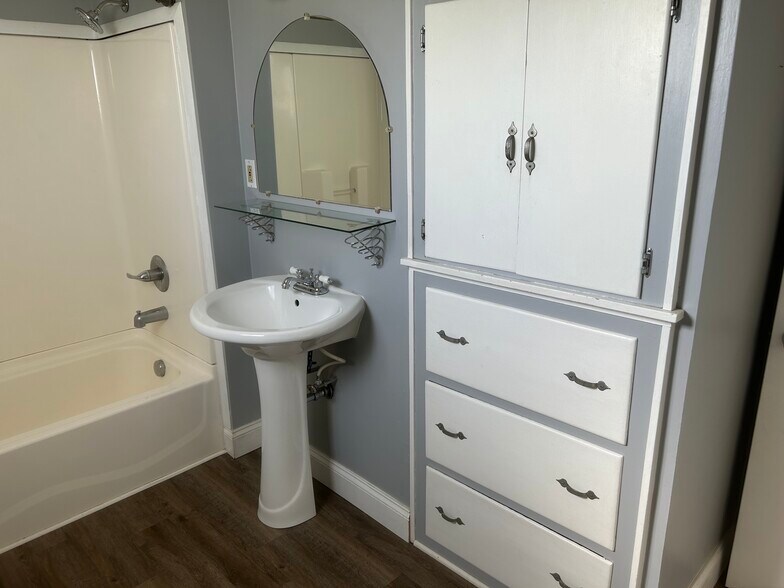 Large bathroom with plenty of linen closet space, new sink, shower and toilet. - 203 Reibold Rd